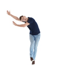 Emotional man in casual clothes posing on white background