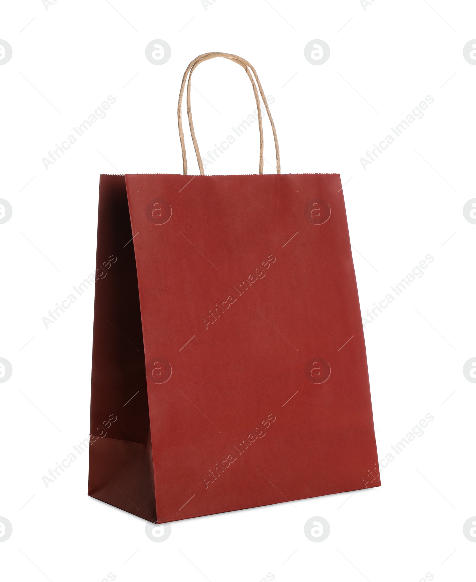 Photo of Blank red paper bag on white background. Space for design