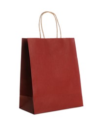 Photo of Blank red paper bag on white background. Space for design