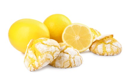 Photo of Tasty homemade lemon cookies and fresh fruits on white background