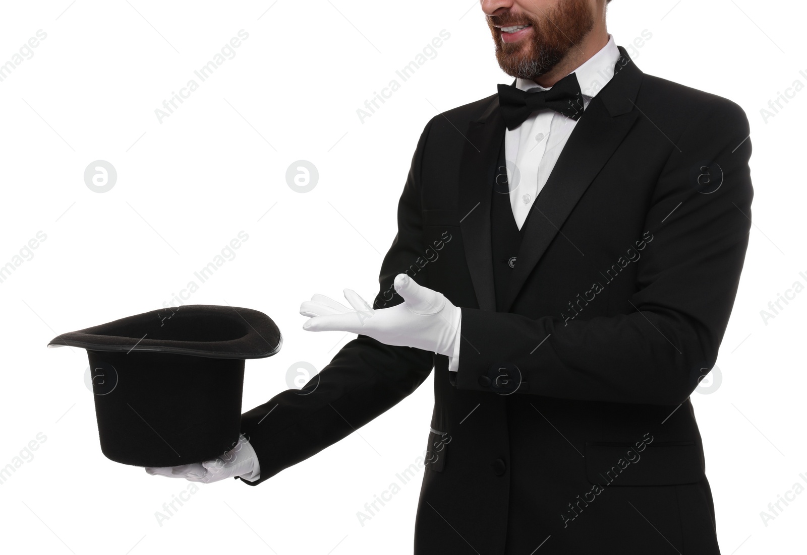 Photo of Magician holding top hat on white background, closeup