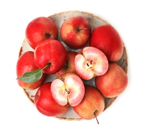 Photo of Plate of tasty apples with red pulp isolated on white, top view