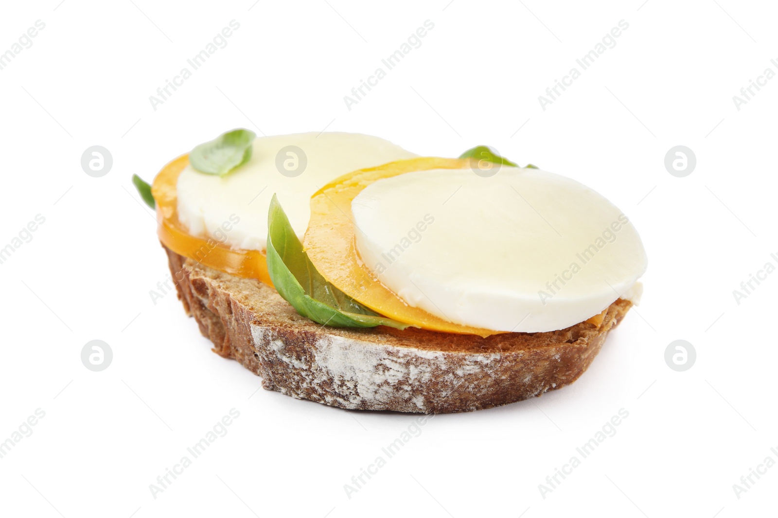 Photo of Delicious sandwich with mozzarella, yellow tomato and basil isolated on white