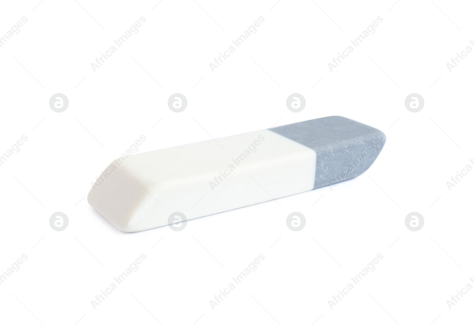 Photo of New double eraser isolated on white. School stationery