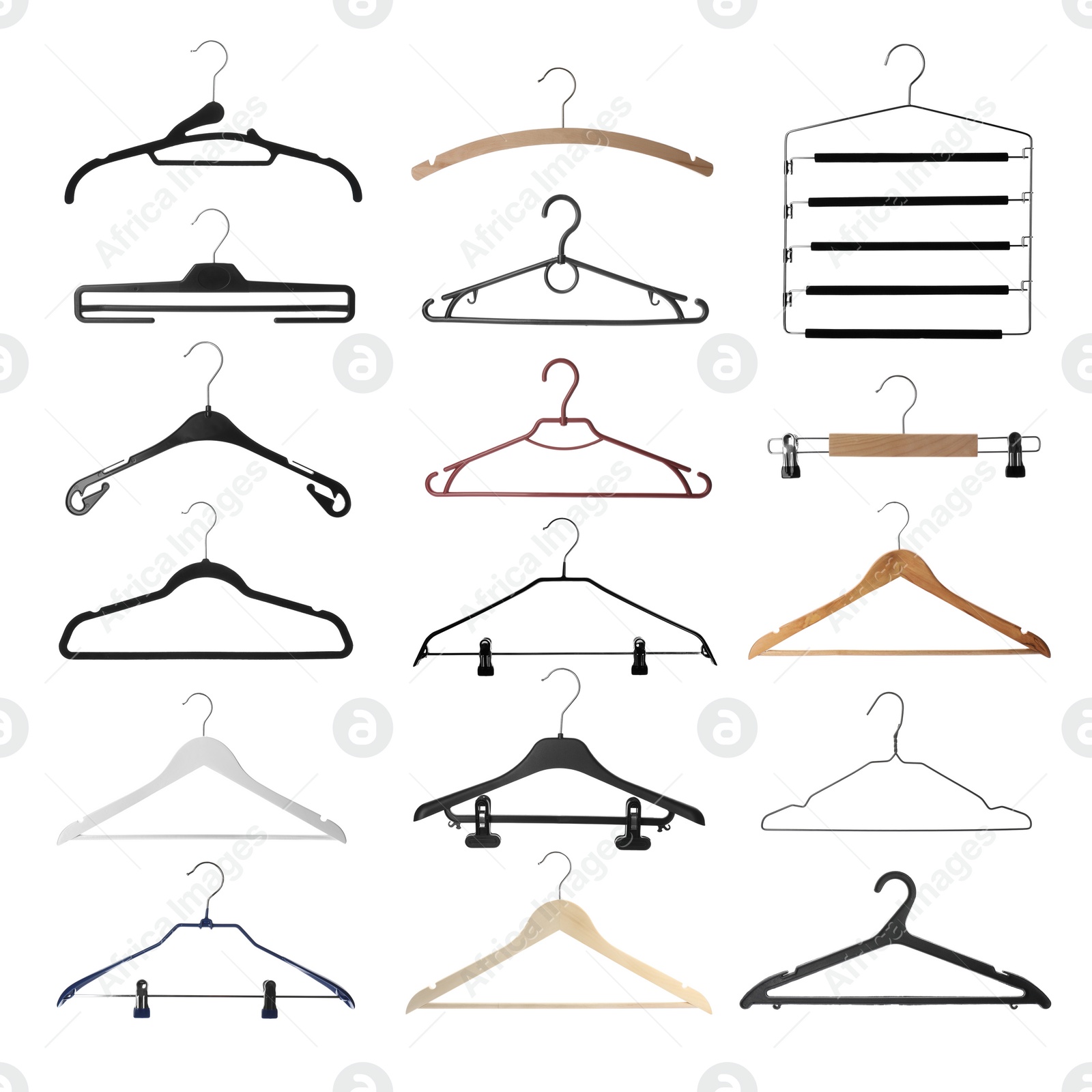 Image of Set with different empty hangers on white background