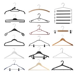 Set with different empty hangers on white background