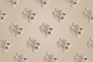 Collage of stylish sneakers on beige background