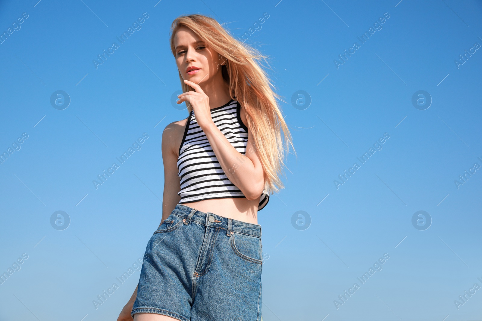 Photo of Beautiful young woman outdoors on sunny day