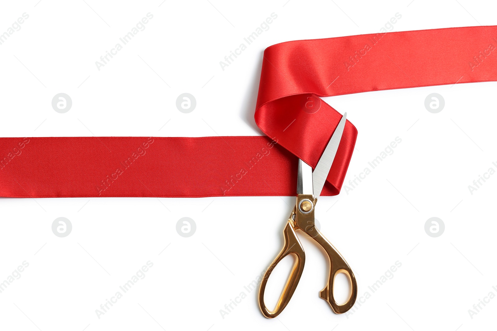 Photo of Ribbon and scissors on white background, top view. Ceremonial red tape cutting