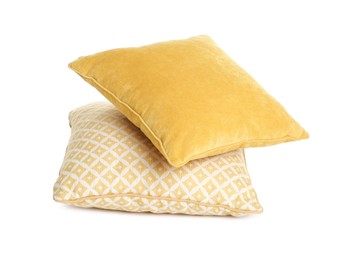 Different colorful decorative pillows on white background