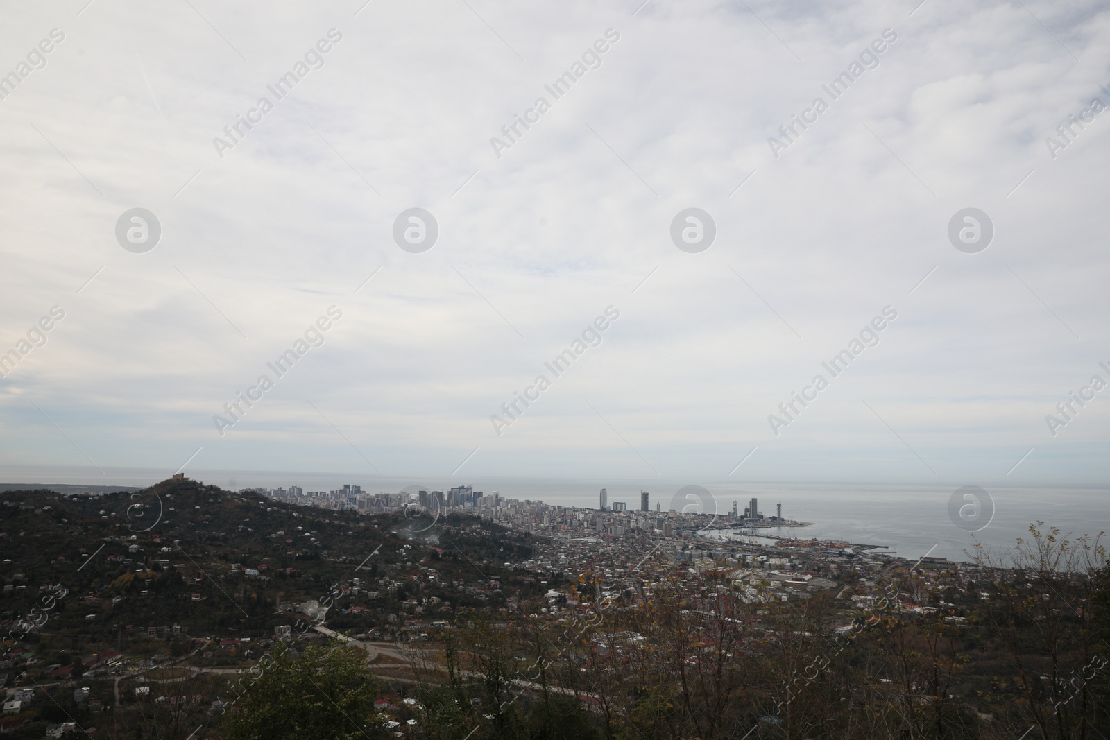 Photo of Picturesque view of city and sea under sky