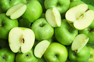 Photo of Fresh green apples as background