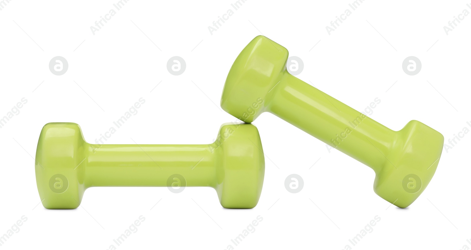 Photo of Light green dumbbells isolated on white. Sports equipment