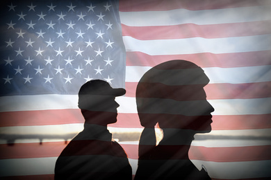 Image of Double exposure with silhouettes of soldiers and American flag. Military service