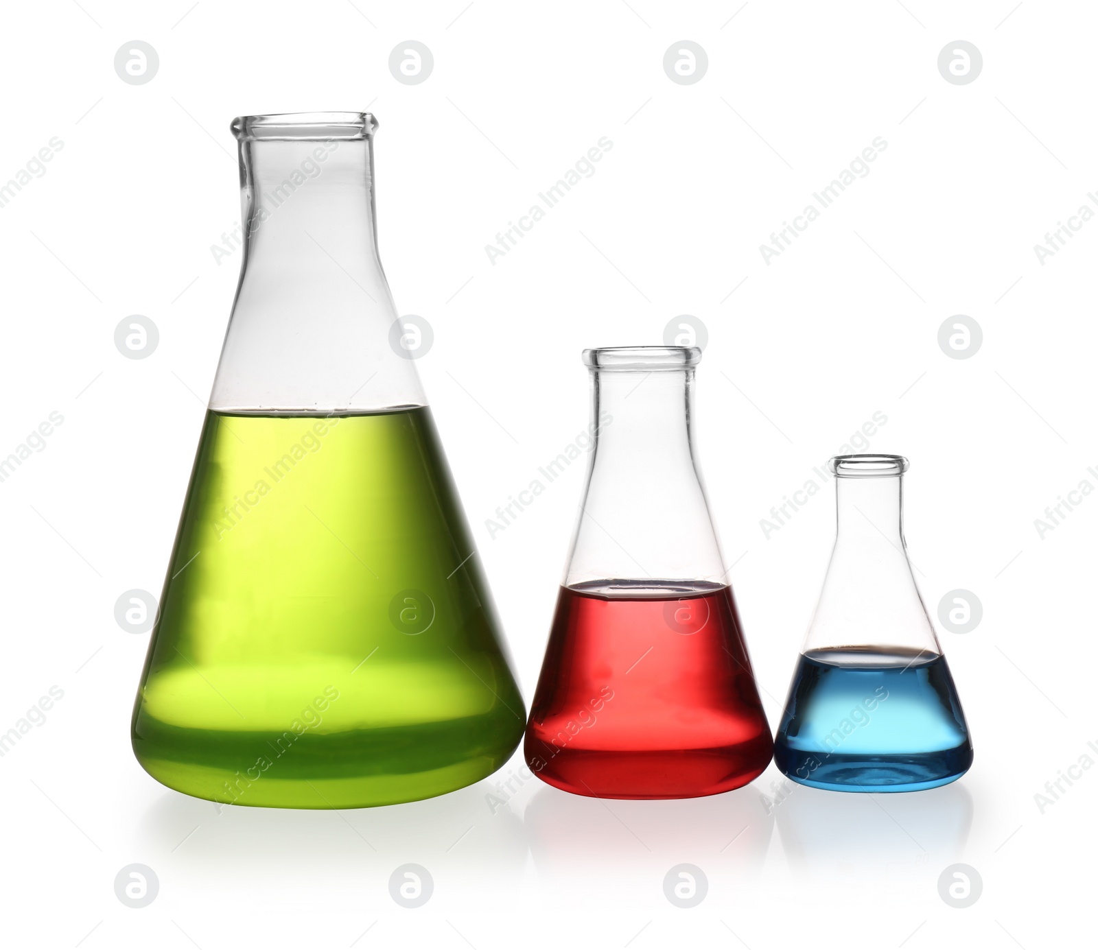 Photo of Erlenmeyer flasks with color liquids isolated on white. Solution chemistry