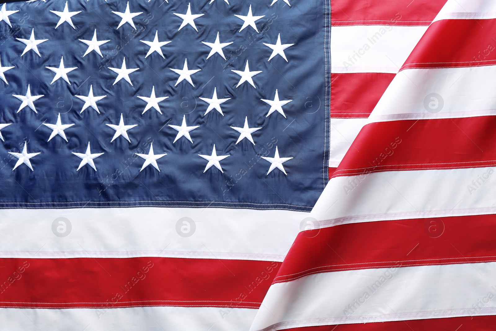 Photo of American flag as background, top view. National symbol of USA