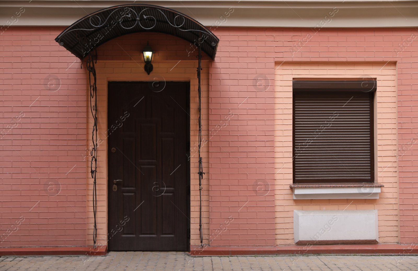 Photo of Facade of building with closed door and window