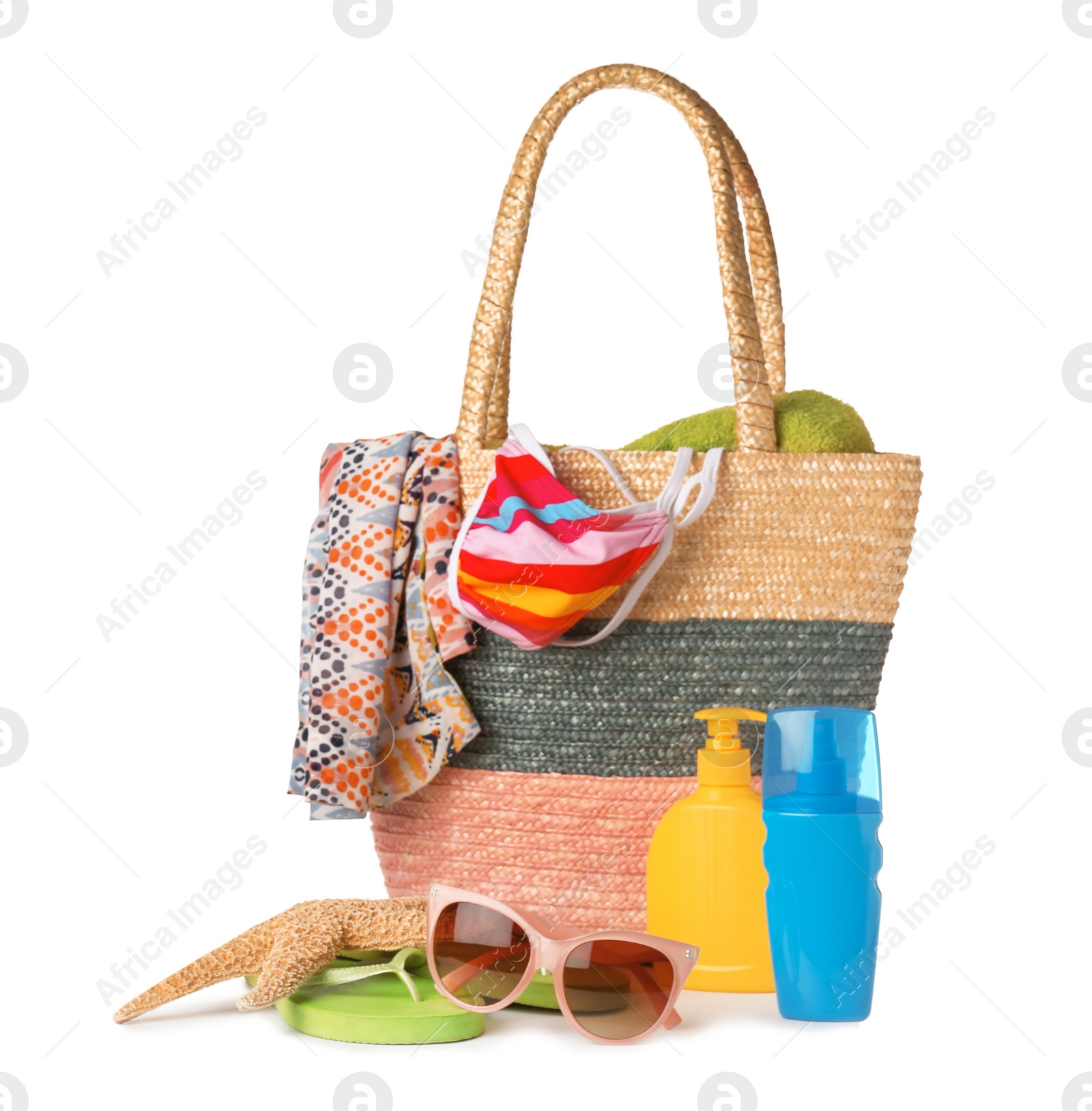 Photo of Set of different beach accessories isolated on white