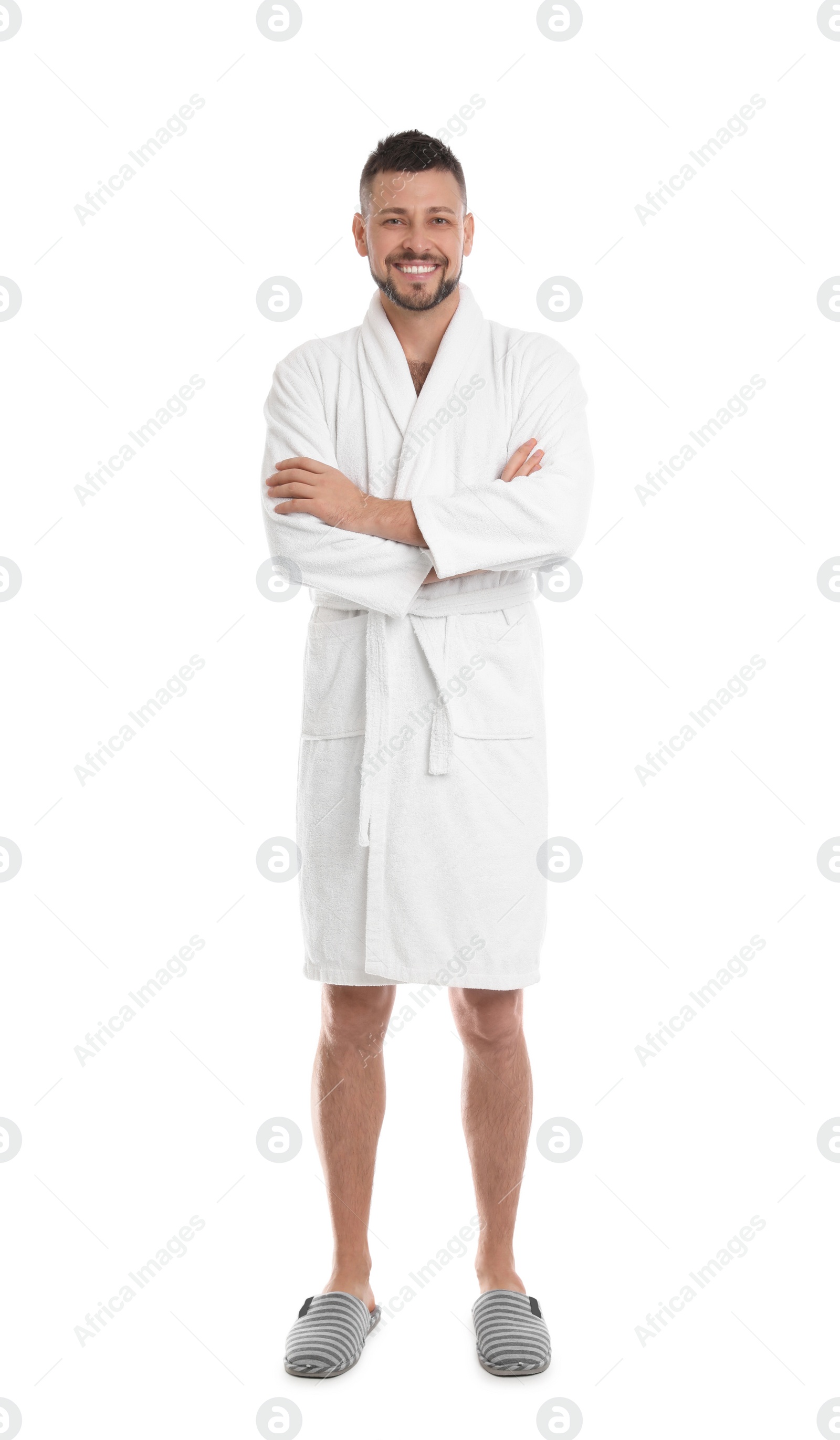 Photo of Handsome man wearing bathrobe on white background