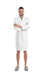 Photo of Handsome man wearing bathrobe on white background