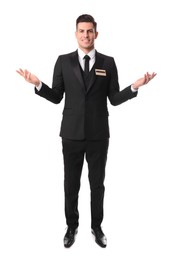 Photo of Full length portrait of happy receptionist in uniform on white background