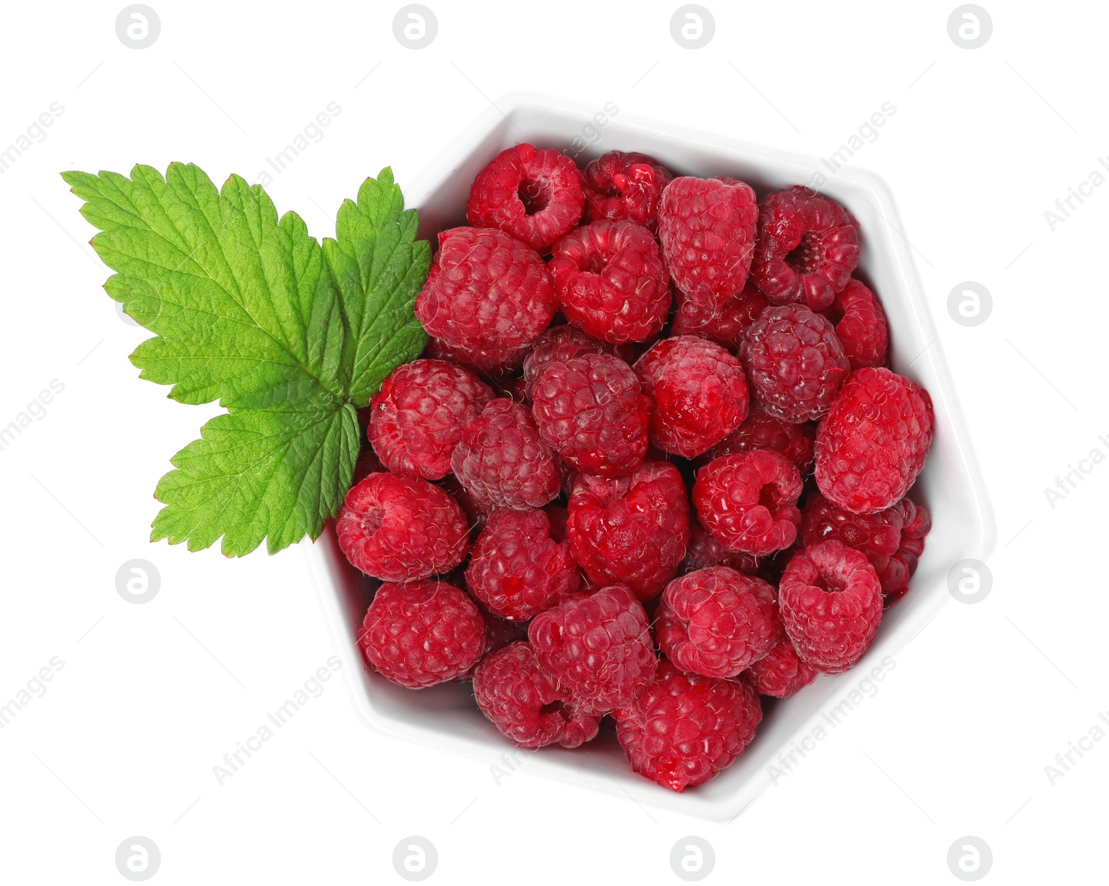 Photo of Bowl with ripe raspberries on white background, top view