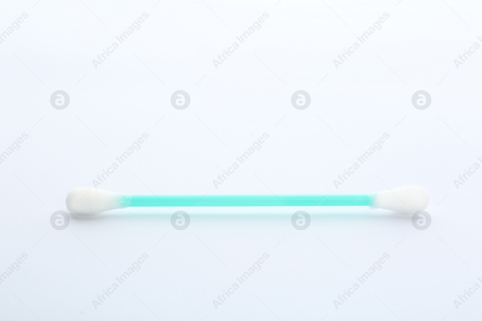 Photo of Plastic cotton swab on white background. Hygienic accessory
