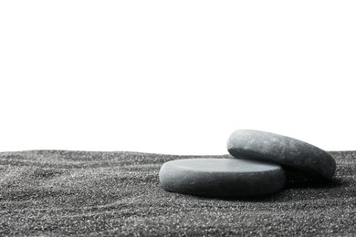 Photo of Presentation of product. Stone podiums on black sand against white background