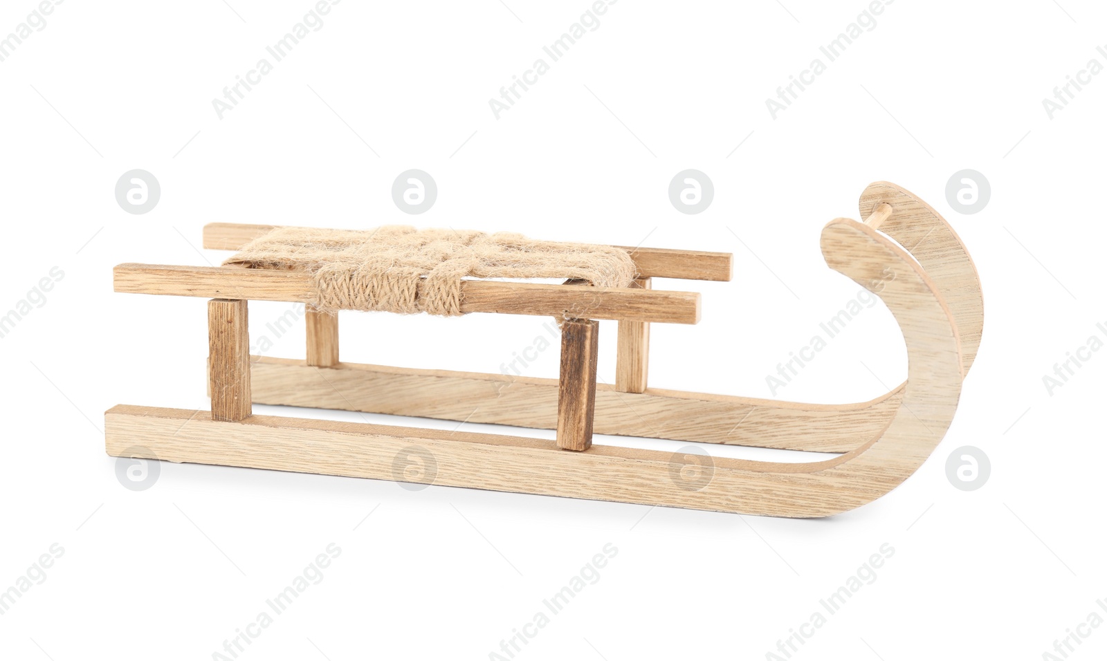 Photo of Empty wooden sleigh on white background. Christmas holiday decor