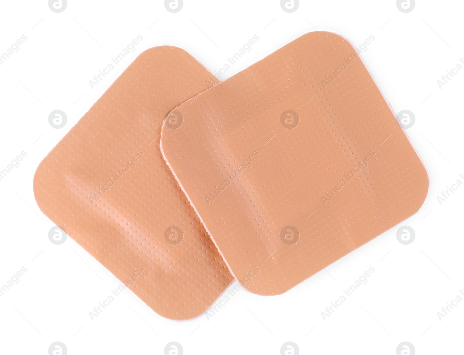 Photo of Medical adhesive bandages isolated on white, top view