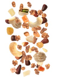 Image of Delicious granola, nuts and dried fruits falling on white background. Healthy snack 