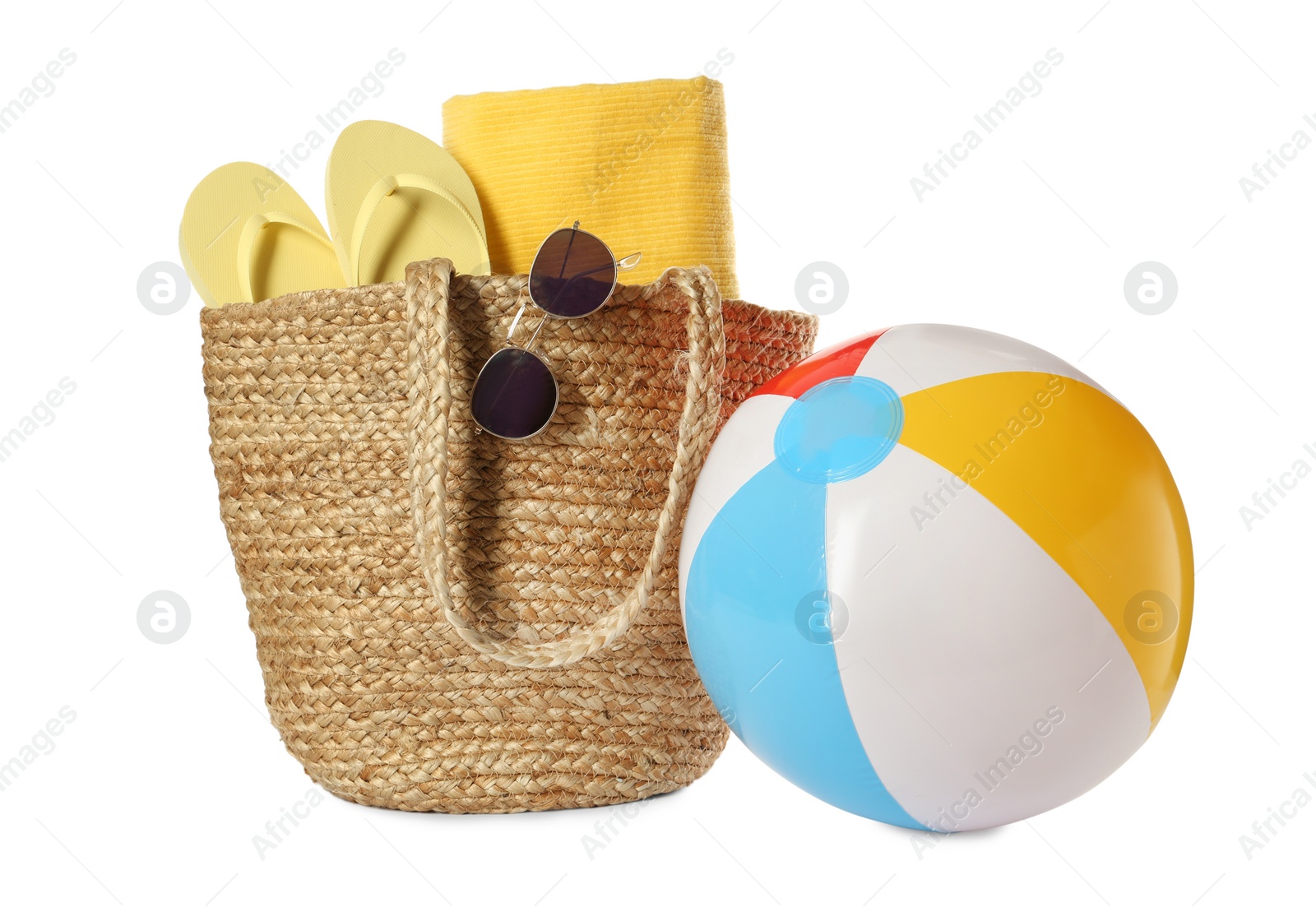 Photo of Inflatable ball and beach accessories on white background