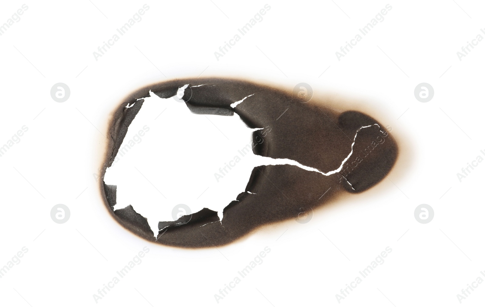 Photo of Burnt hole in paper on white background