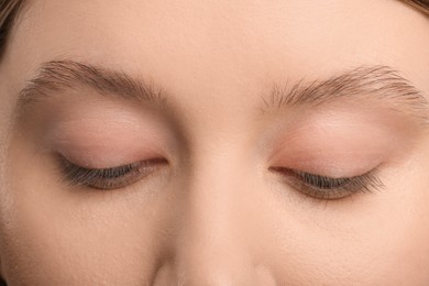 Photo of Woman with beautiful natural eyelashes, closeup view