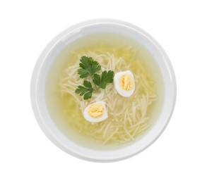 Photo of Tasty soup with noodles, egg and parsley in bowl isolated on white, top view
