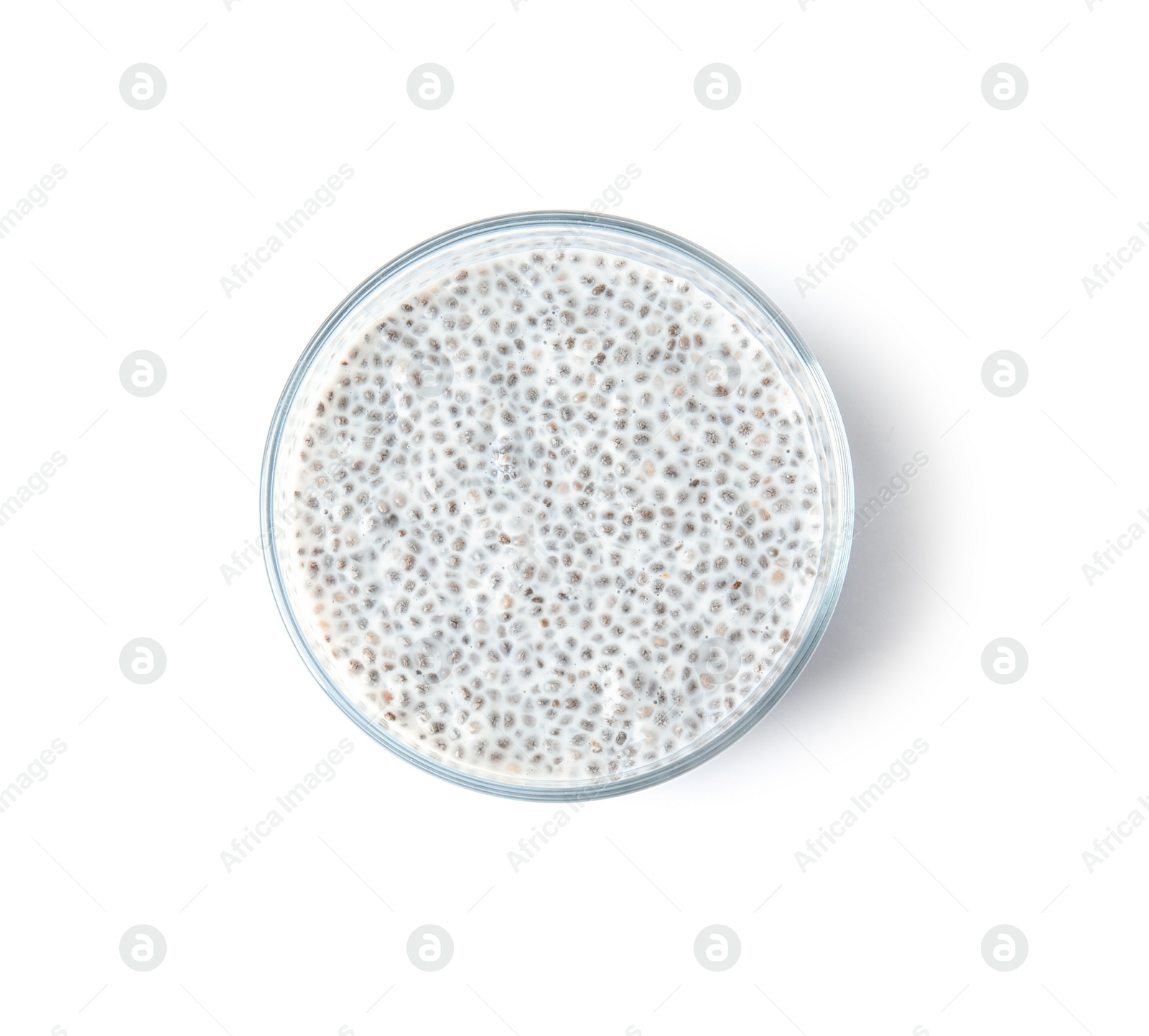 Photo of Dessert bowl of tasty chia seed pudding isolated on white, top view