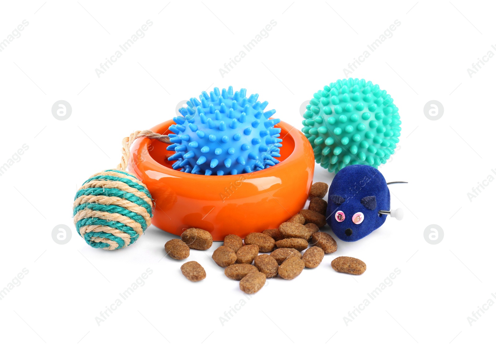 Photo of Pet dry food, bowl and toys on white background. Shop assortment