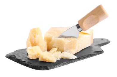 Photo of Parmesan cheese with knife and slate plate on white background
