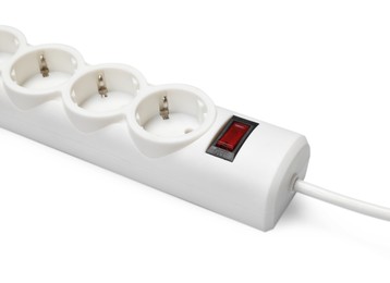 Photo of Power strip with switch button on white background, closeup