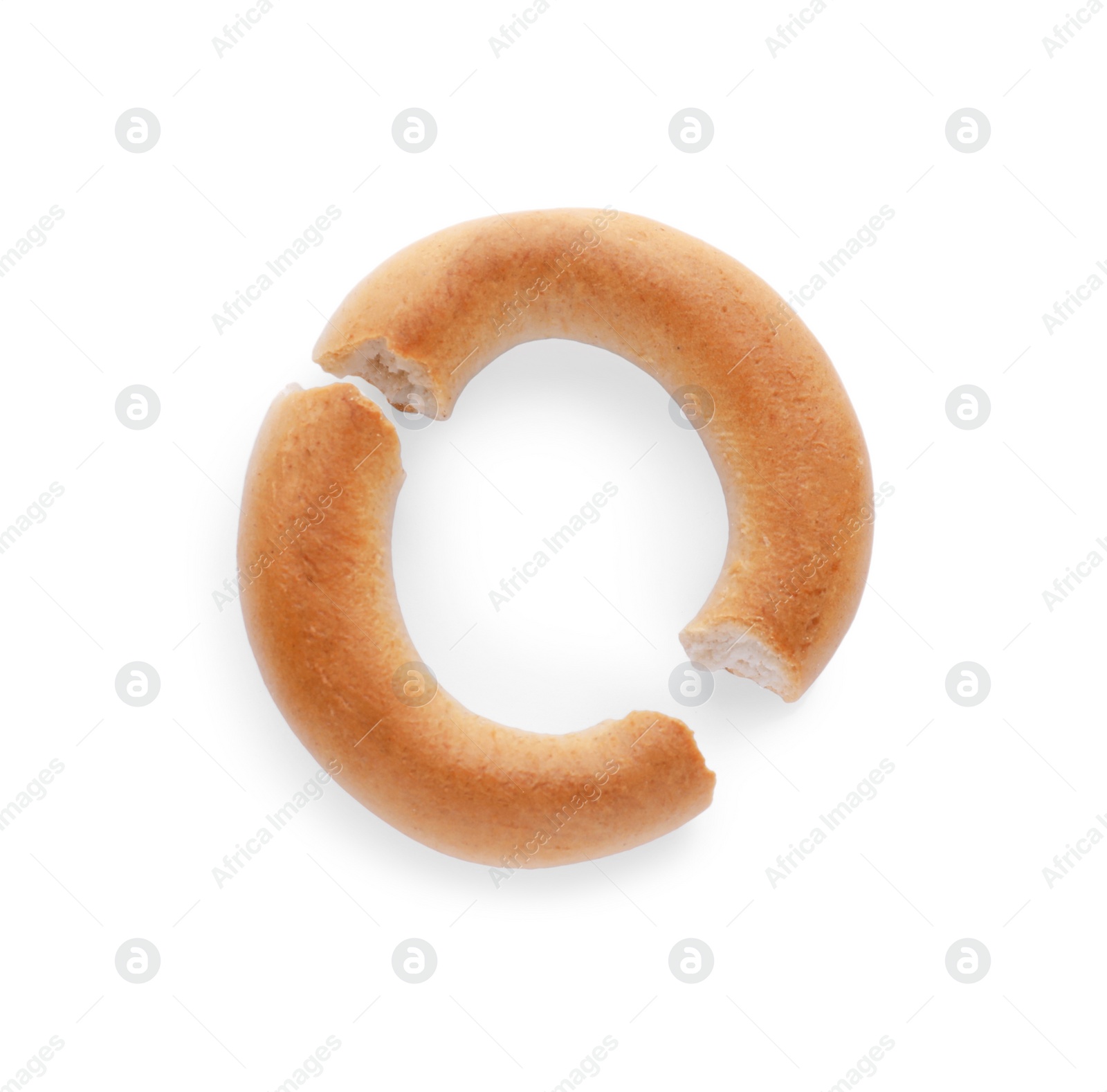 Photo of Crushed tasty dry bagel (sushki) isolated on white, top view