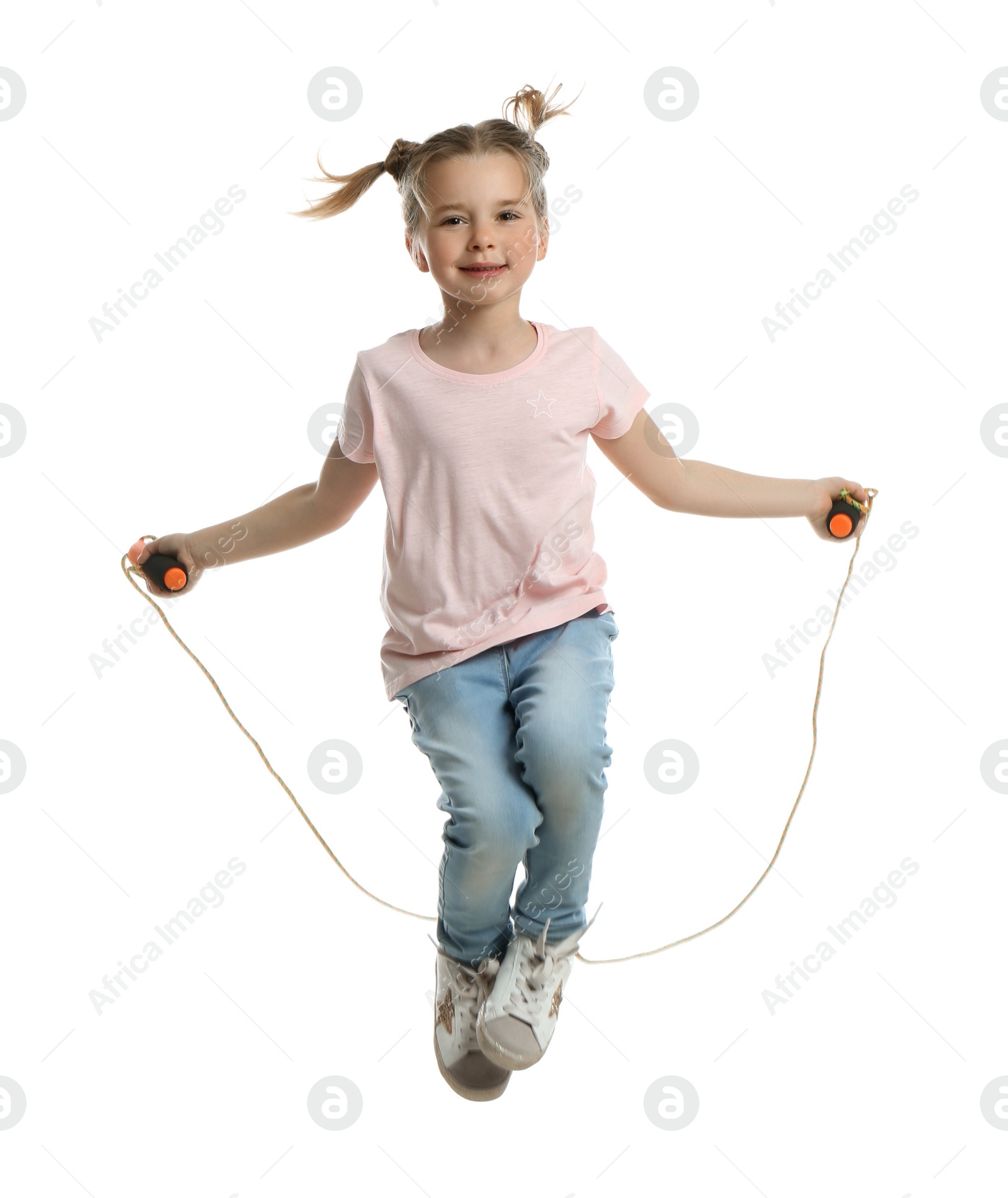 Photo of Cute little girl with jump rope on white background