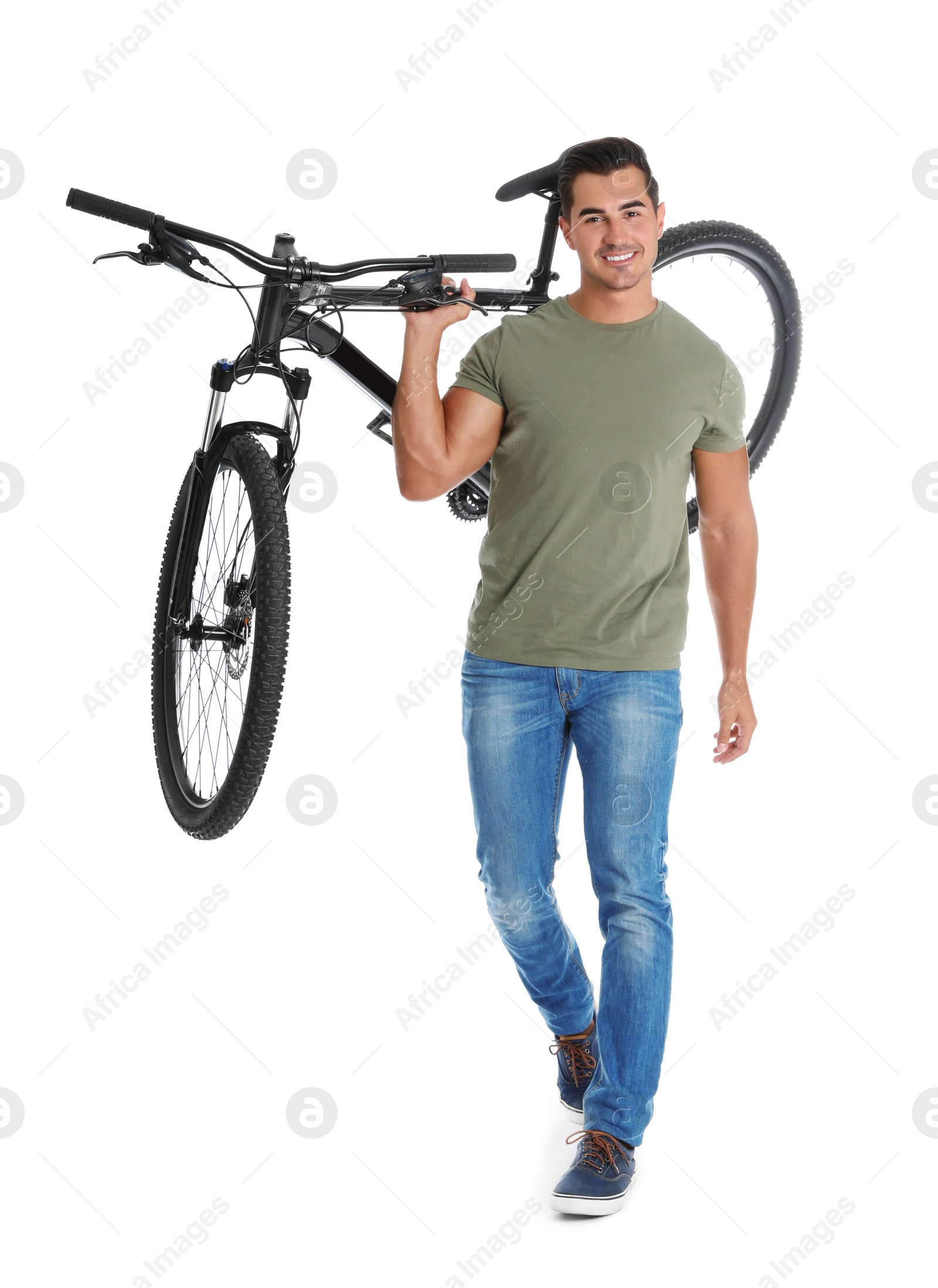 Photo of Handsome young man with modern bicycle on white background