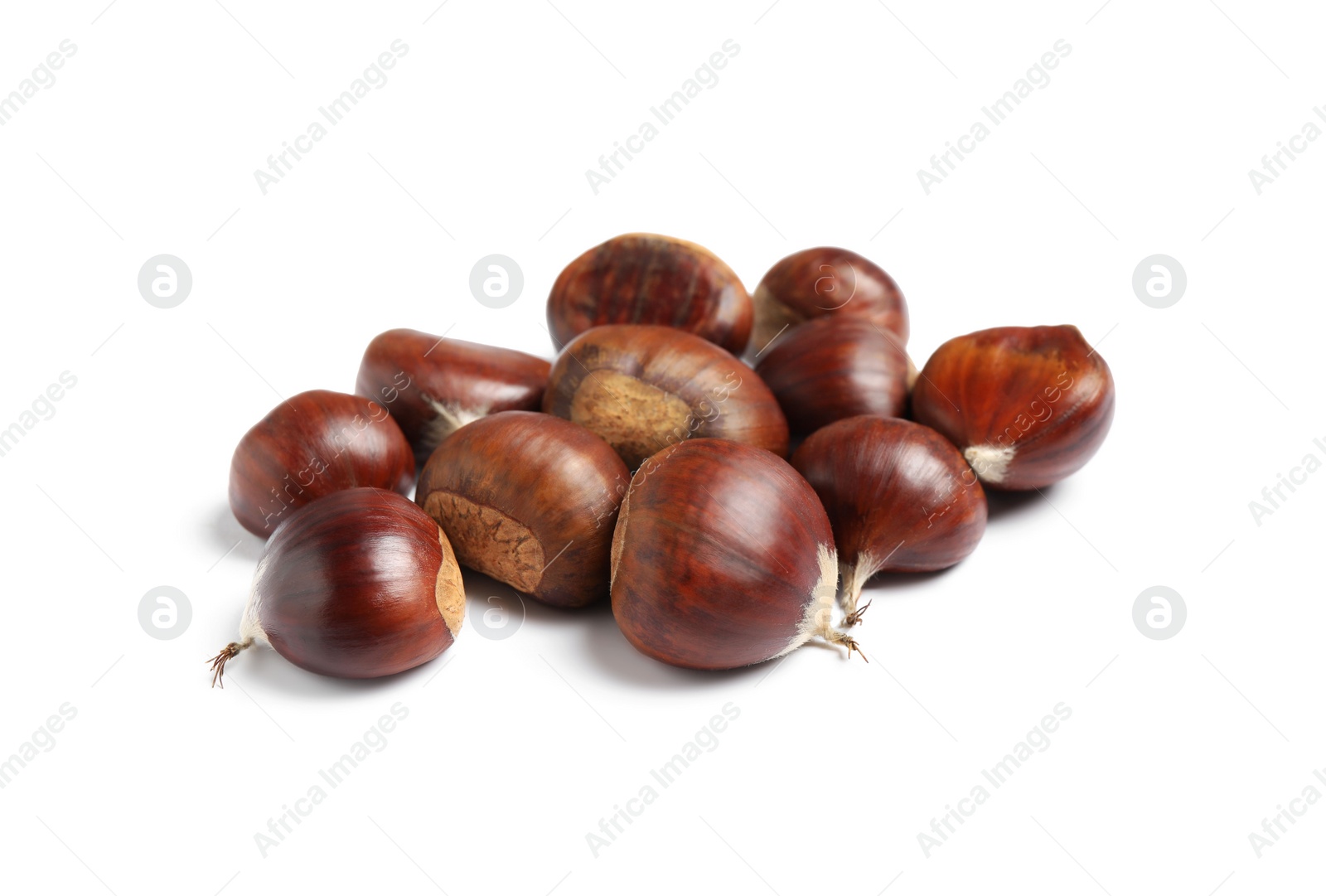 Photo of Fresh sweet edible chestnuts on white background