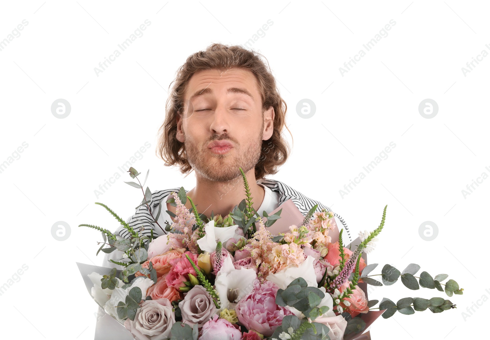 Photo of Young handsome man with beautiful flower bouquet on white background