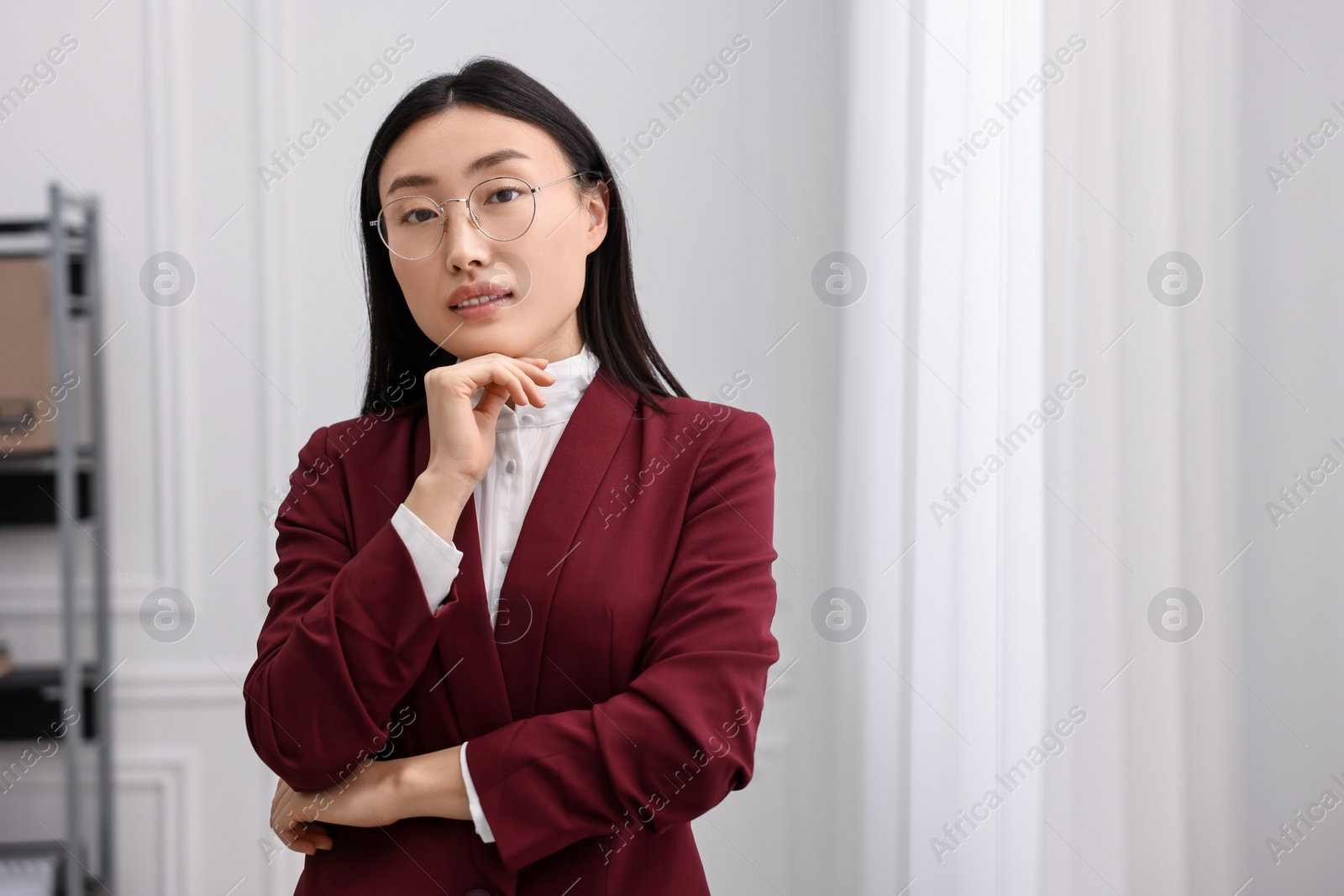 Photo of Portrait of notary in office. Space for text