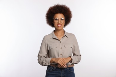 Photo of Portrait of beautiful young woman in stylish eyeglasses on white background