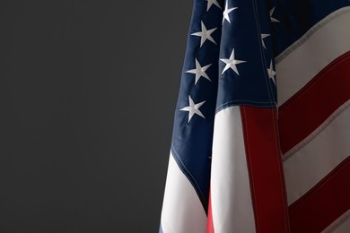 Photo of America flag on grey background, closeup with space for text. Memorial Day