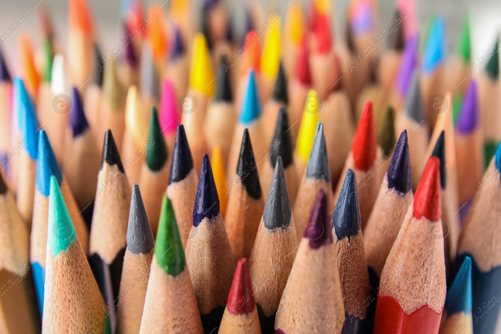 Photo of Different color pencils as background, closeup view