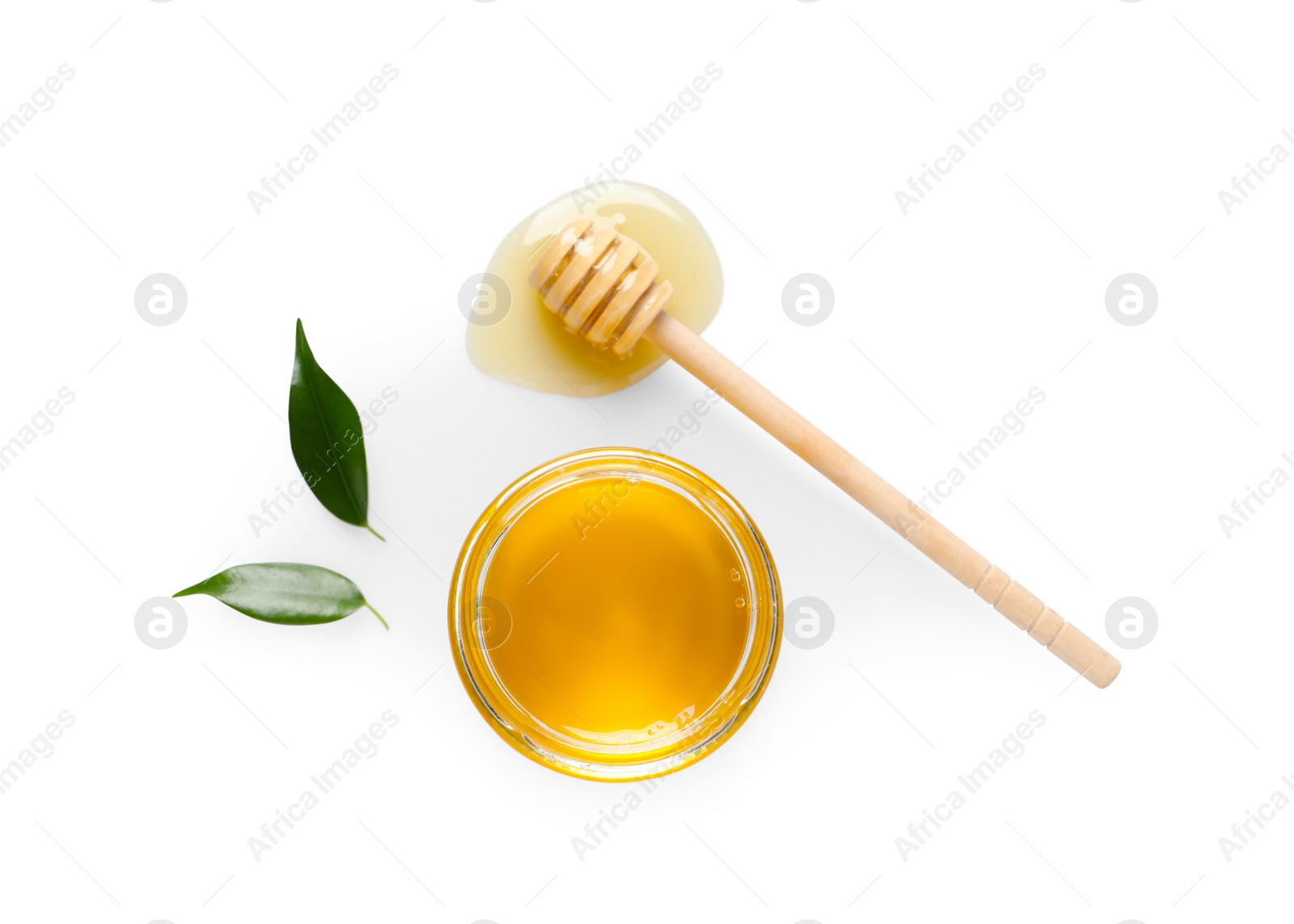 Photo of Tasty honey in glass jar, leaves and dipper on white background, flat lay. Space for text