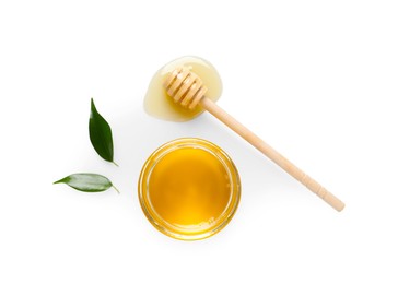 Photo of Tasty honey in glass jar, leaves and dipper on white background, flat lay. Space for text